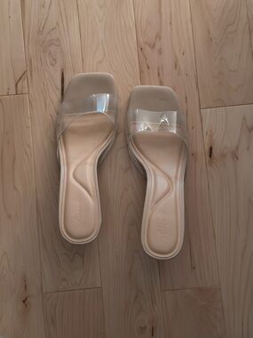Clear and beige heeled wedge sandals